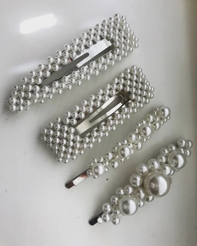 Trendy hårspenne med hvite perler